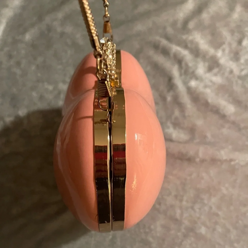 Heart-Shaped Pink Clutch with Gold Handle